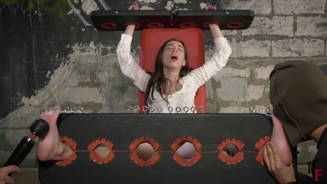 Long Tickling Procedure for Home Girl in Stocks. Tickling with Four Hands