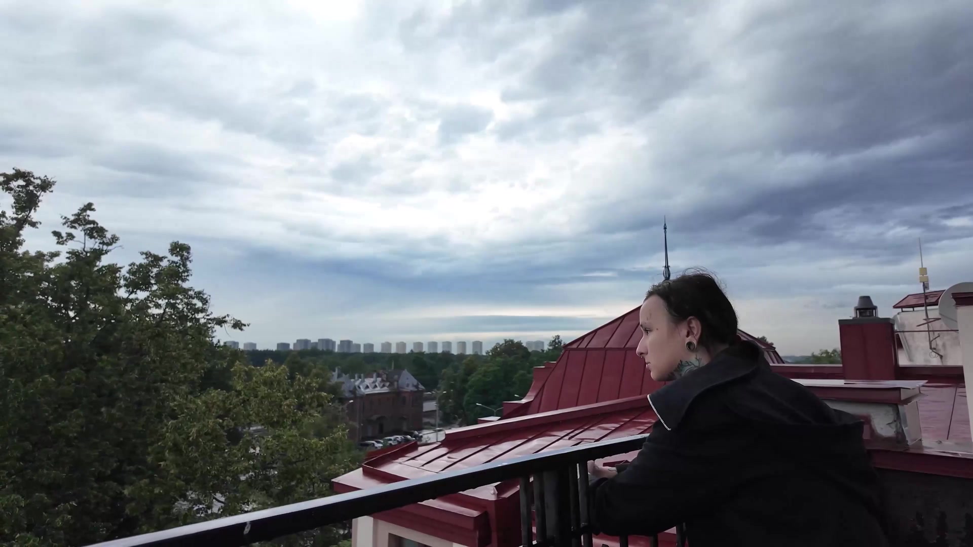 Small ass stretched on a public terrace